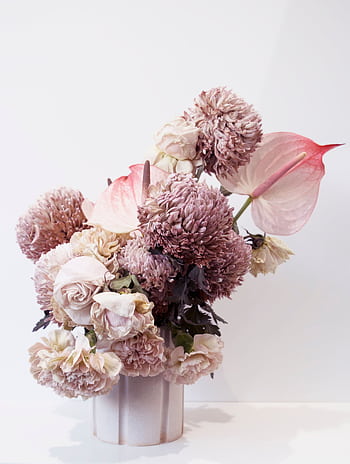 A classic arrangement of pink dried flowers captured in a soft, muted light. HD phone wallpaper