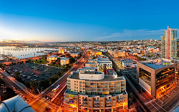 seaside city at sunset, city, bay, streets, marina, sunset HD wallpaper
