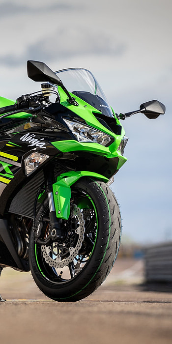 Kawasaki, Elite motorcycle brand, Cutting-edge engineering, Unleashing the thrill HD phone wallpaper