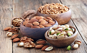 Nutty bliss, Mouthwatering delight, Flavorful bite, Nut-filled treat HD wallpaper