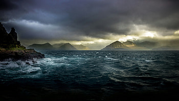 Majestic Mountain Reflections Under Stormy Skies In , sky, mountains, nature HD wallpaper