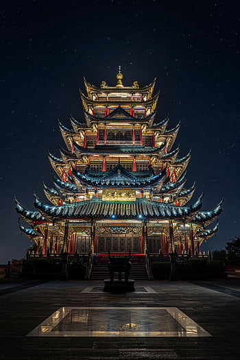 Stunning view of an illuminated pagoda temple in Chongqing at nighttime. HD phone wallpaper