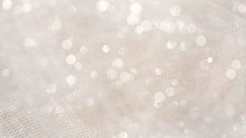Soft focus white bokeh lights creating a magical, shimmering abstract background. HD wallpaper