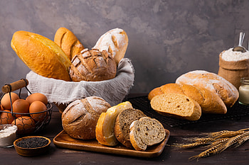 Freshly baked loaf, Warm crusty bread, Delicious aroma, Sliced perfection HD wallpaper