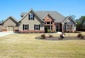 Elegant suburban family house with large lawn and driveway, ideal for real estate listings. HD wallpaper
