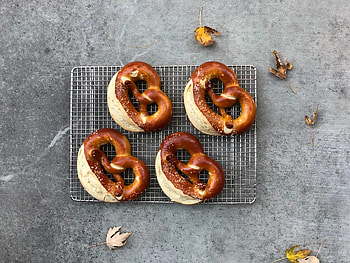 German pretzels, Sausage pairing, Traditional combination, Savory indulgence HD wallpaper