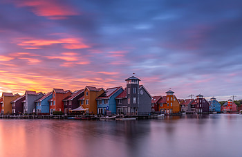Groningen Landscape: Colorful Houses under Dramatic Sky in the Netherlands, landscape, Netherlands, Groningen, house, sky HD wallpaper