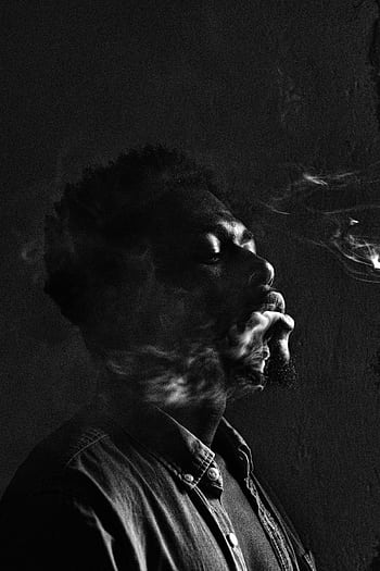 Stylish monochrome portrait of a man immersed in smoke. HD phone wallpaper
