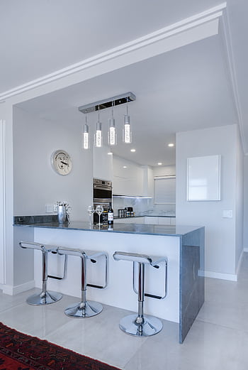 Sleek modern kitchen interior in Cape Town showcasing contemporary design elements. HD phone wallpaper