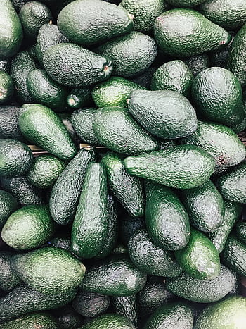 A pile of fresh Hass avocados, perfect for healthy eating and keto diets. Vibrant and nutritious. HD phone wallpaper