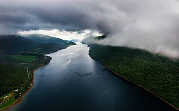 Clouds over Norwegian fjords, Ethereal fjord landscapes, Breathtaking panoramic views, Nature's masterpiece HD wallpaper