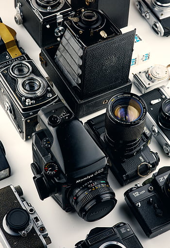 Explore a diverse array of vintage and modern cameras showcasing timeless graphy technology. HD phone wallpaper