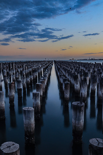 Beach, wooden pole, evening HD phone wallpaper