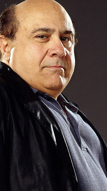 Danny DeVito, Iconic actor, Charming personality, Stunning visuals HD phone wallpaper
