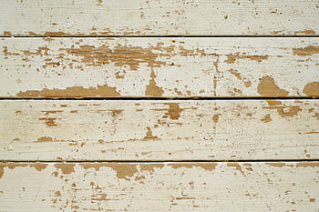 Close-up of old weathered wooden planks with peeling white paint for a rustic texture. HD wallpaper