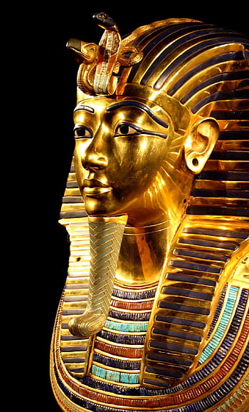 Close-up of Tutankhamun's gilded death mask showcasing intricate design. HD phone wallpaper