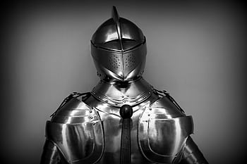 Close-up shot of vintage medieval knight armor in monochrome. HD wallpaper