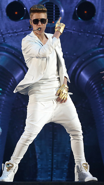 Bieber's music, Golden gloves, Iconic fashion, Celebrity vibes HD phone wallpaper