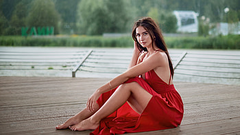 Beautiful Girl Model Is Posing For A Wearing Red Dress Sitting In Blur Nature Background Girls HD wallpaper