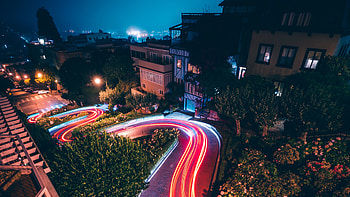 City, night, road turn, traffic lights, lights trail HD wallpaper