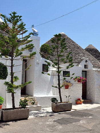 Italy's hidden gem, Quaint trulli houses, Vibrant city streets HD phone wallpaper