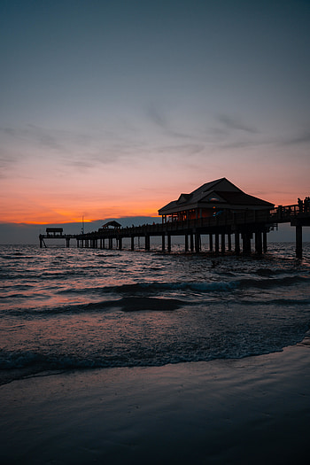 Hut at pier, beach, sunset HD phone wallpaper