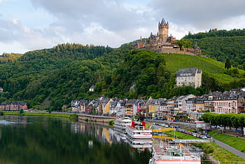Idyllic landscape of Cochem Castle overlooking Moselle River in Germany. HD wallpaper