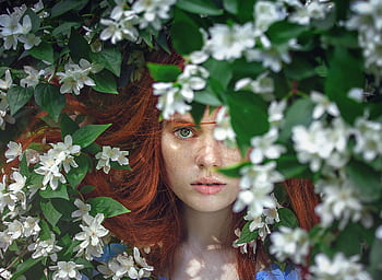 Artistic portrait of a red-haired woman surrounded by white flowers. HD wallpaper