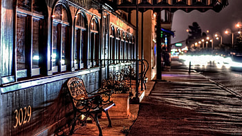 bench outside a restaurant at night r, night, bench, restaurant, sidewalk, street, r HD wallpaper