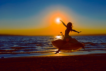 Dancing with the sun, beautiful girl, sea, sand, dance, girl, beauty, beach, waves, light, love, sun, sunset HD wallpaper