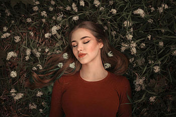 Girl Lying On Grass Bed Closed Eyes , grass, girls, model HD wallpaper