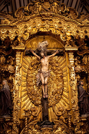 Intricate golden statue of Jesus on the cross in Porto church altar. HD phone wallpaper