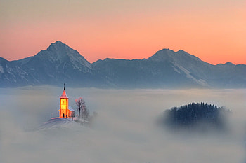 Church lights, winter, barren, valley, lights, snow, church, mountains HD wallpaper