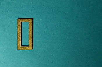 A gold rectangular frame casting a shadow on a teal background, minimal and artistic. HD wallpaper