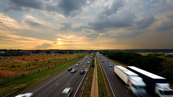 Cities, Sunset, Sky, Cars, Road, Traffic, Movement HD wallpaper