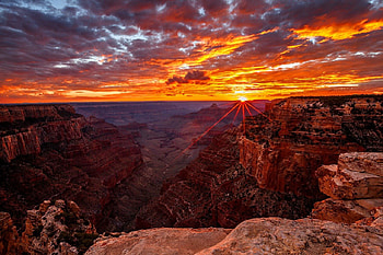 Grand canyon sunrise, rays, glow, sunrise, nice, fiery, canyon, shine, amazing, Grand canyon, sun, golden, beautiful, rocks, summer, light, red, view, clouds, nature, sky, lovely HD wallpaper