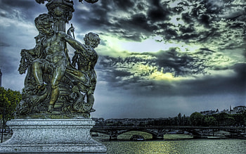 Sculptures, sea, city, clouds, bridge, sky HD wallpaper