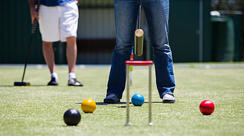 Competitive croquet, Skillful gameplay, Tulipani-themed event, Erosion-inspired design HD wallpaper