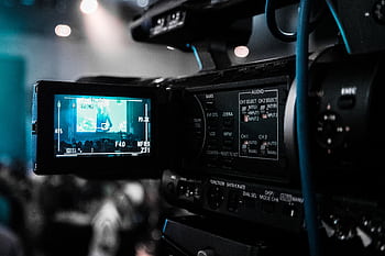 video camera capturing a live event; focus on screen and controls. HD wallpaper
