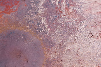 Detailed close-up of a marbled surface showcasing swirling colors and textures. HD wallpaper