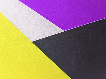 Vibrant geometric composition with yellow, purple, black, and white paper textures. HD wallpaper