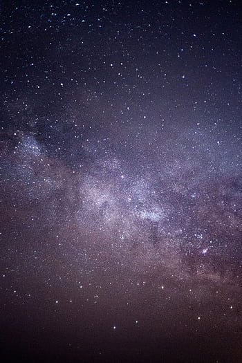 Breathtaking view of the Milky Way galaxy twinkling in the night sky full of stars. HD phone wallpaper