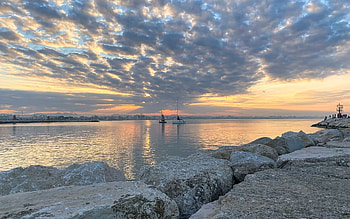Clouds over Sea, sea, grey, clouds, rocks, sunset HD wallpaper