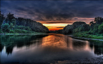 reflected sunset, clouds, trees, water, sun HD wallpaper