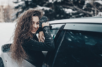 Girl In Snow Coming Out Of Car Window, girls, snow, model HD wallpaper