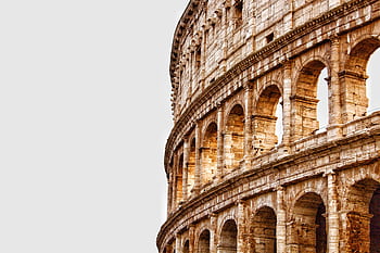 Detailed view of the Colosseum's arches in Rome, showcasing ancient Roman architecture. HD wallpaper
