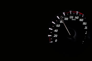 Speedometer reading showing speed in km/h on a dark background. HD wallpaper