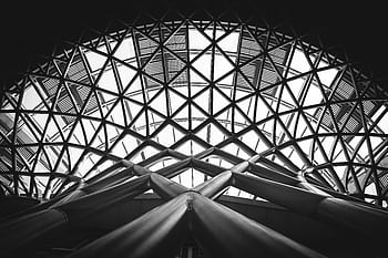 A striking black and white of a modern steel dome with geometric patterns. HD wallpaper
