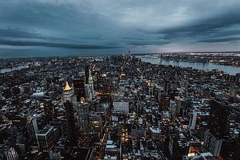Stunning aerial view of New York City's skyscrapers and skyline at dusk, showcasing the urban landscape. HD wallpaper
