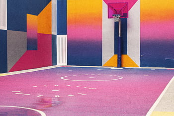 Colorful graffiti-covered basketball court showcasing urban street art in vibrant hues. HD wallpaper